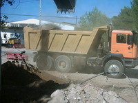 Norte, la excavadora cargando el camión